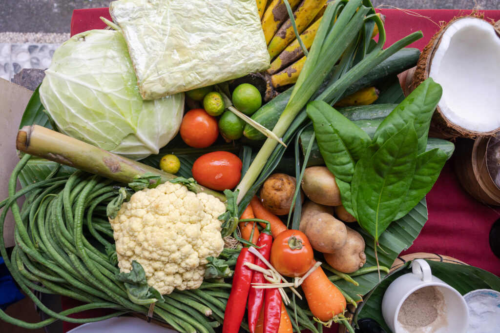 Top down view of vegetable ingredients for a Balinese cooking class, horizontal
